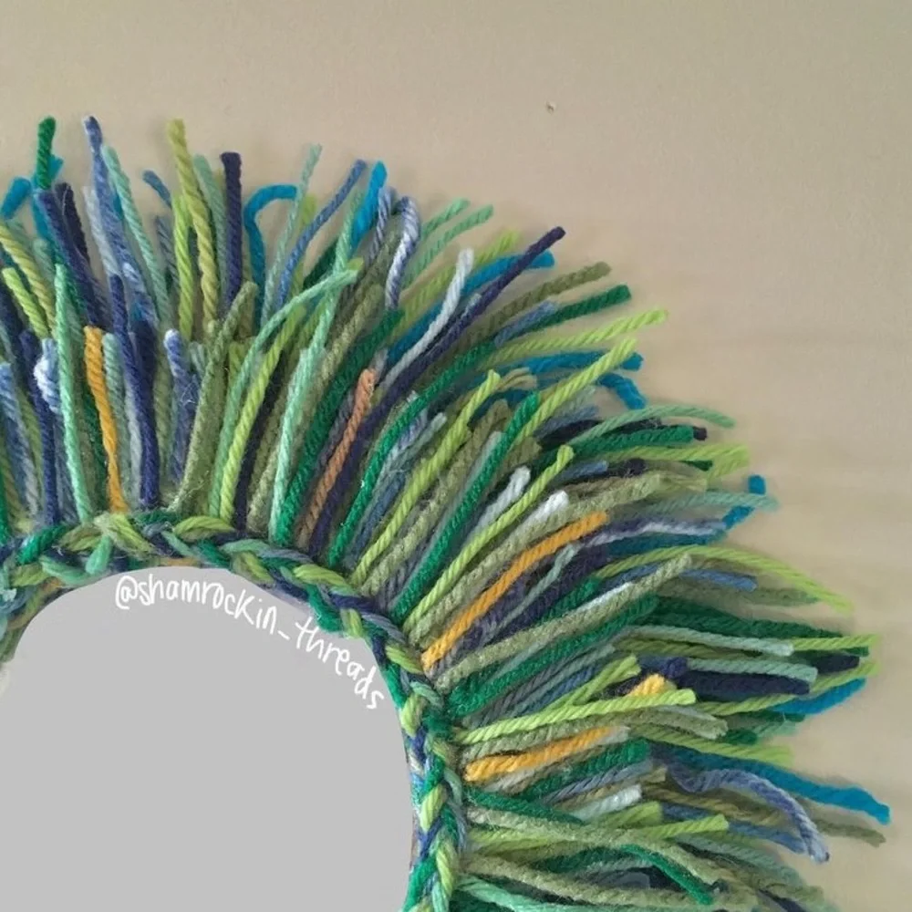 blue green and gold fringe mirror